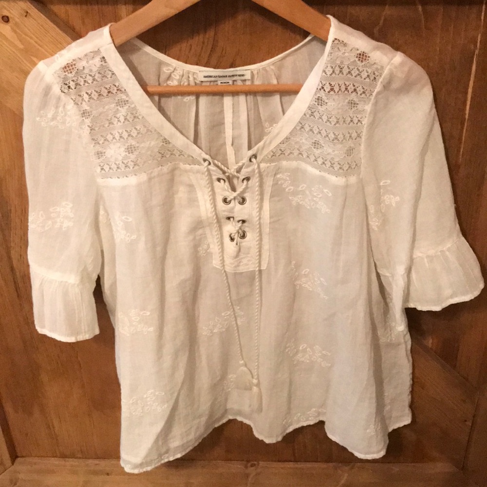White sheer shirt.
